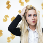 A woman with blonde hair and dollars in the background